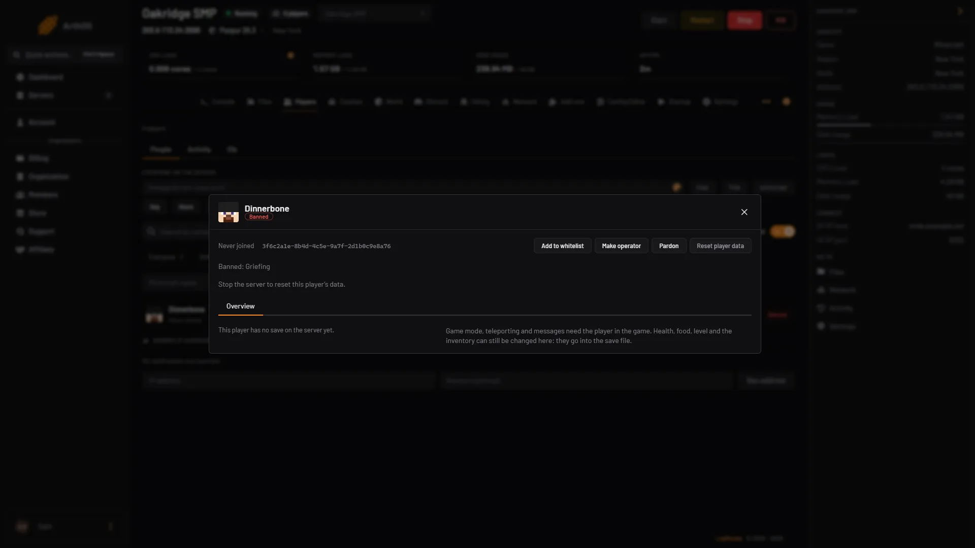 A banned player's window with the reason and the Pardon button